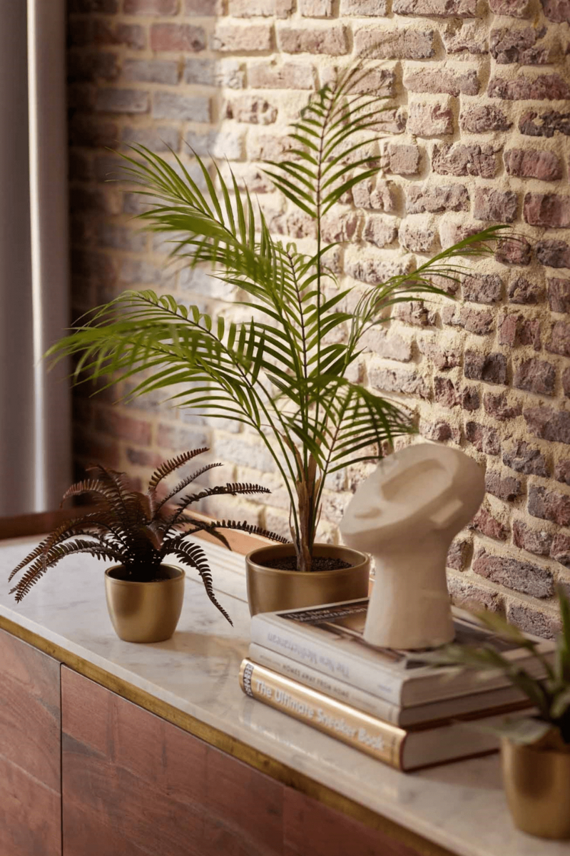 Mooie kunstpalm voor een tropisch interieur